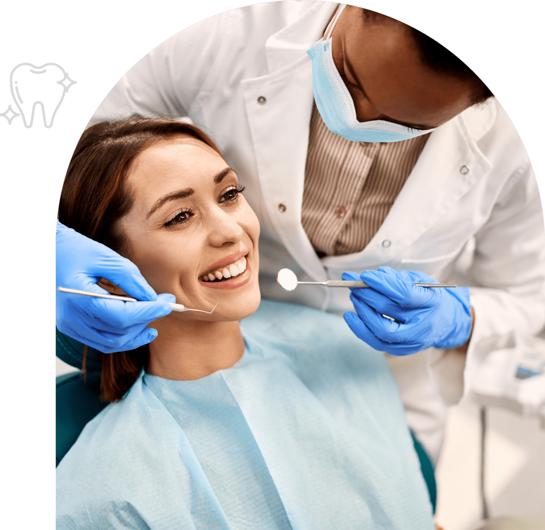 Costa Mesa Family Dentistry with Dr Almodovar | Dentist in gloves and mask examines a smiling patient in a dental chair, holding dental instruments.