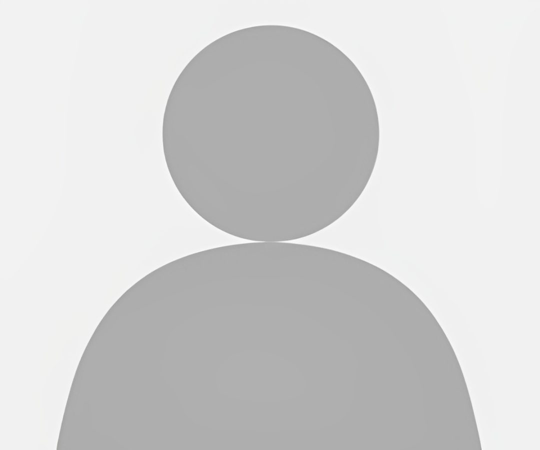 This is a gray placeholder silhouette of a person against a light background, commonly used for default profile images.